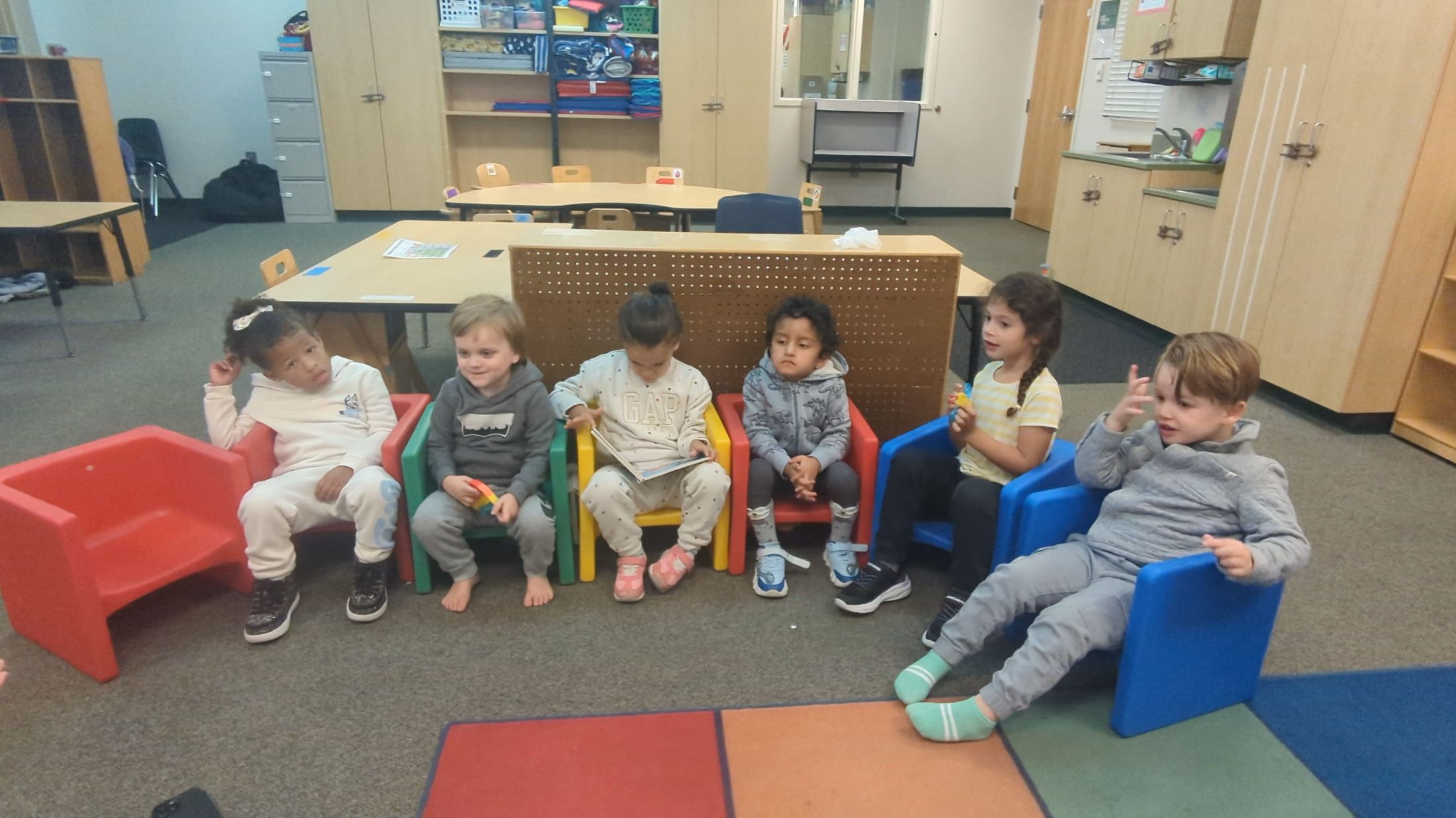 PreK students in chairs - 